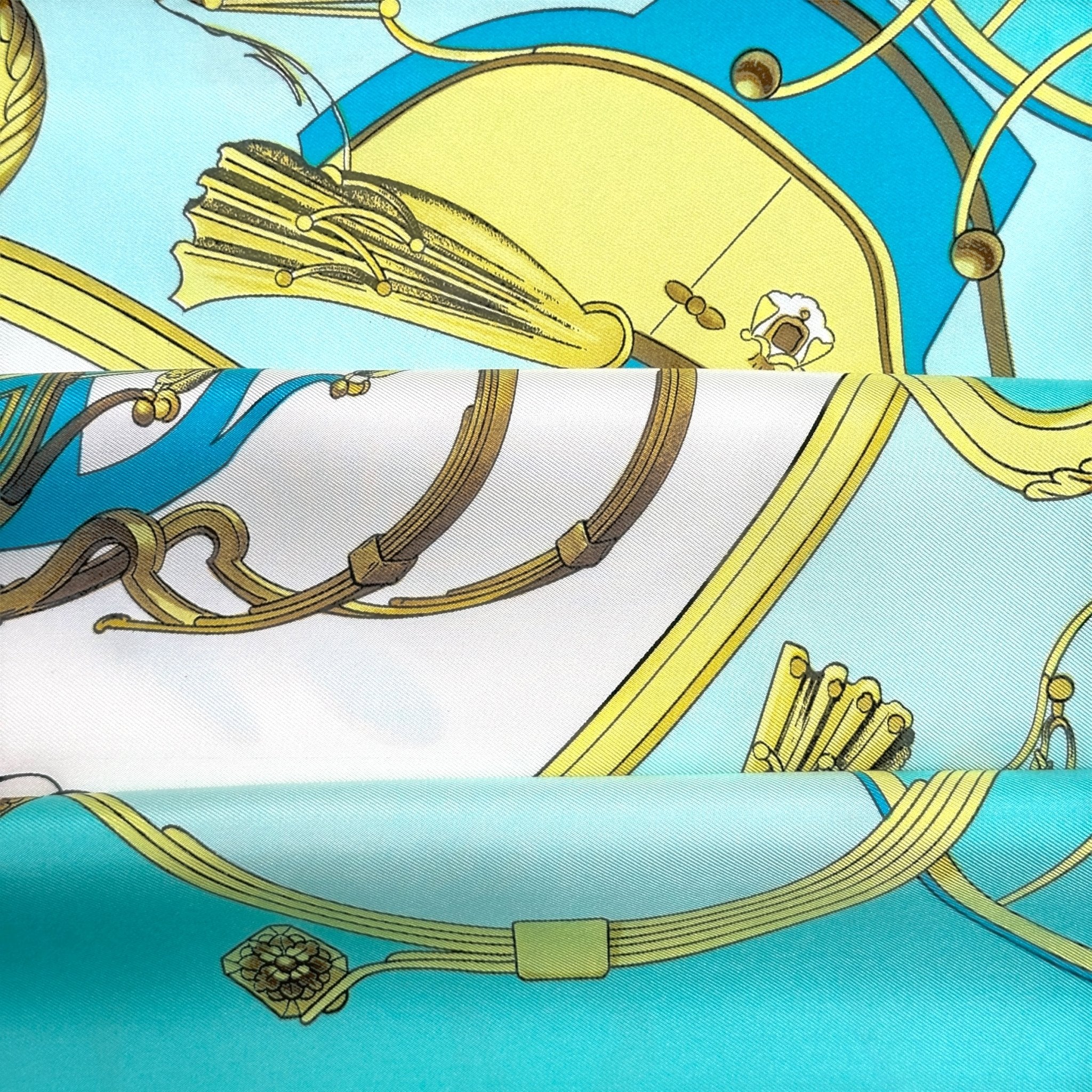 foulard hermes springs camaiu de bleu ciel azur et turquoise avec des dessins de couleur jaune