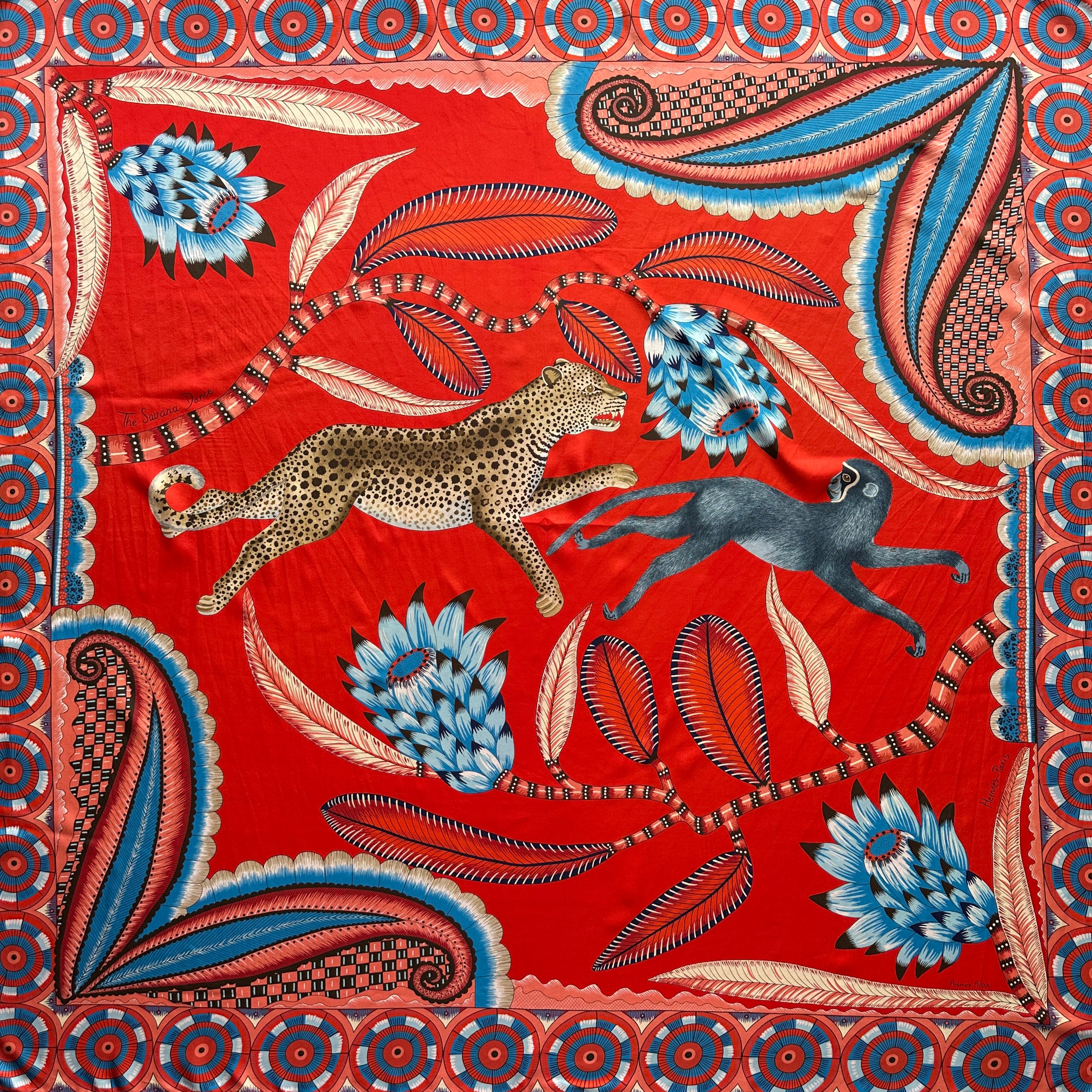 Motif au centre d'un léopard chassant un singe du Châle Hermès 140 cm "The Savana Dance" par Ardmore Artists 